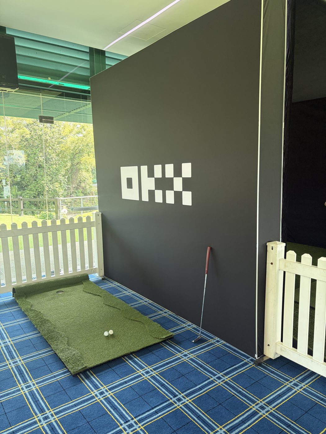 OKX golf bay backlit wall